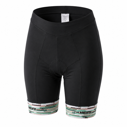 Black cycling shorts with a padded seat and patterned cuffs featuring the brand name HEINI.